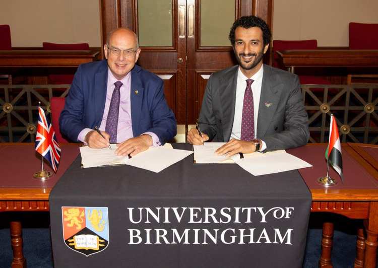 Professor Sir David Eastwood, Vice-Chancellor of the University of Birmingham and Minister of Economy H.E. Abdulla Bin Touq Al Mari sign the collaboration agreement (John James).