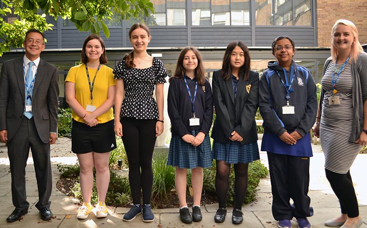 Pictured from left to right are: Dr Andrew Flint, St Mary's Teacher of History & Politics /High Performance Learning Lead, a selection of student members from the International Committee and St Mary's International Coordinator, Miss Dutton.