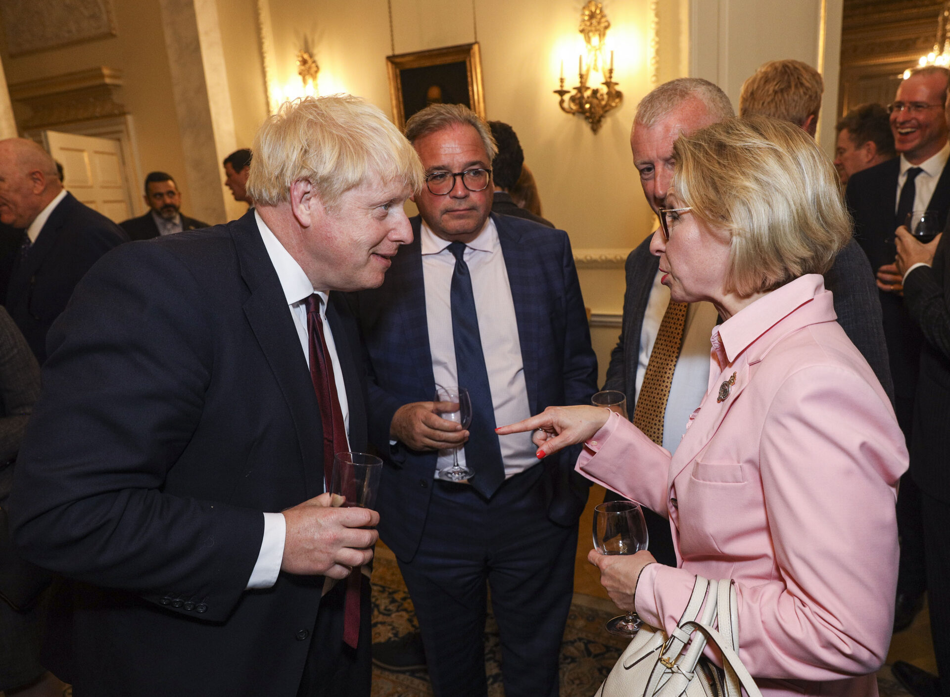 The Prime Minister Boris Johnson in conversation with Jurga Zilinskiene at a business reception at Number 10