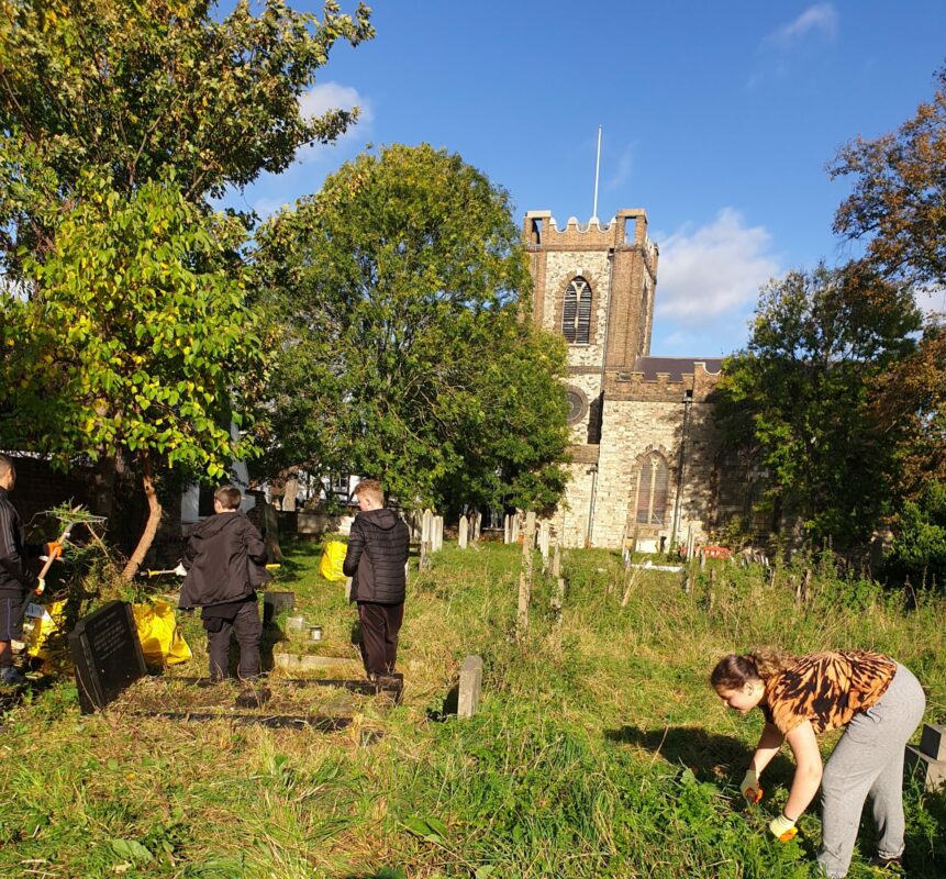 Barking & Dagenham College’s Uniformed Public Service students volunteering at St Peter and St Paul’s Church. 