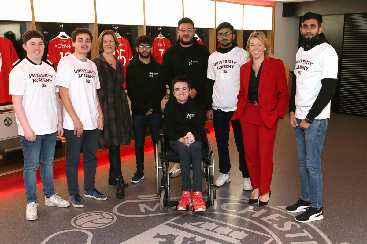 Photo shows from left: UA92 students Matthew Owen, Joao Avillez, Sara Prowse (UA92 CEO), Husni Syed, Sebastian Miranda, Mike Luty, Mohammed Pathan, Collette Roche (Manchester United COO), Fajal Lala