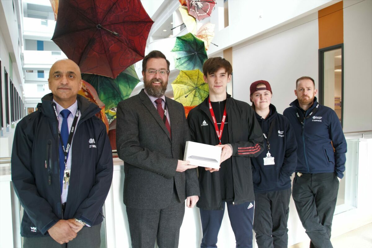 (Left to right) Azhar Iqbal, Director of IT; David Akeroyd, Deputy Principal Development and Productivity; George Weller, Sport student and winner of Safer Internet Week Roadshow competition; Kasey Clifton, IT Support Apprentice; and Martin Thornton, IT Support Specialist.