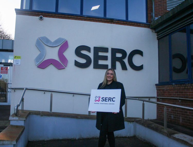 Erin Sanderson with a serc logo