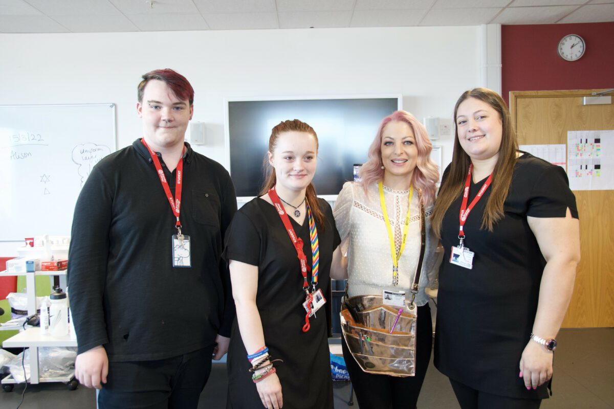 L-R: Hairdressing students Toby Lee, Hailie McCann and Rachel Thompson, with Sheree Thompson from Siren Hair Art (second from right)