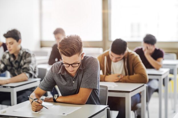 Students writing in an exam