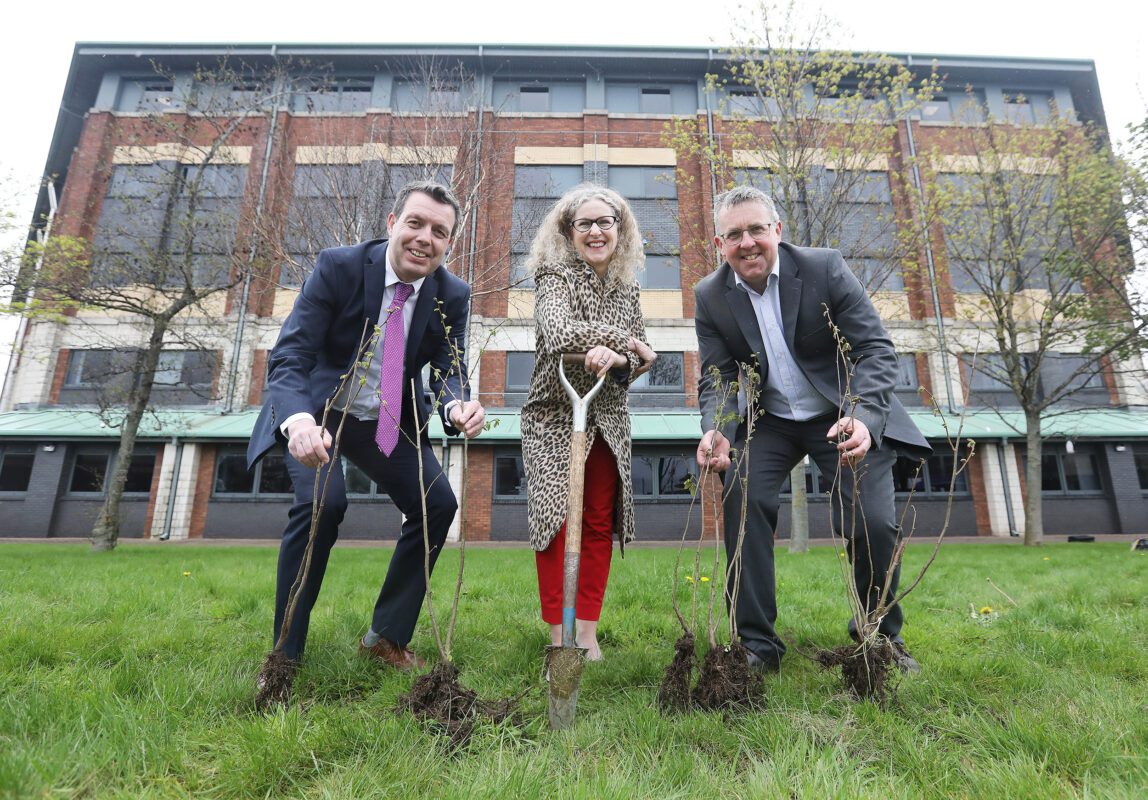 Louise Warde Hunter tree planting in Millfield to mark Earth Day 2022 with Raymond DeLargy (L) and Peter Kane (R).