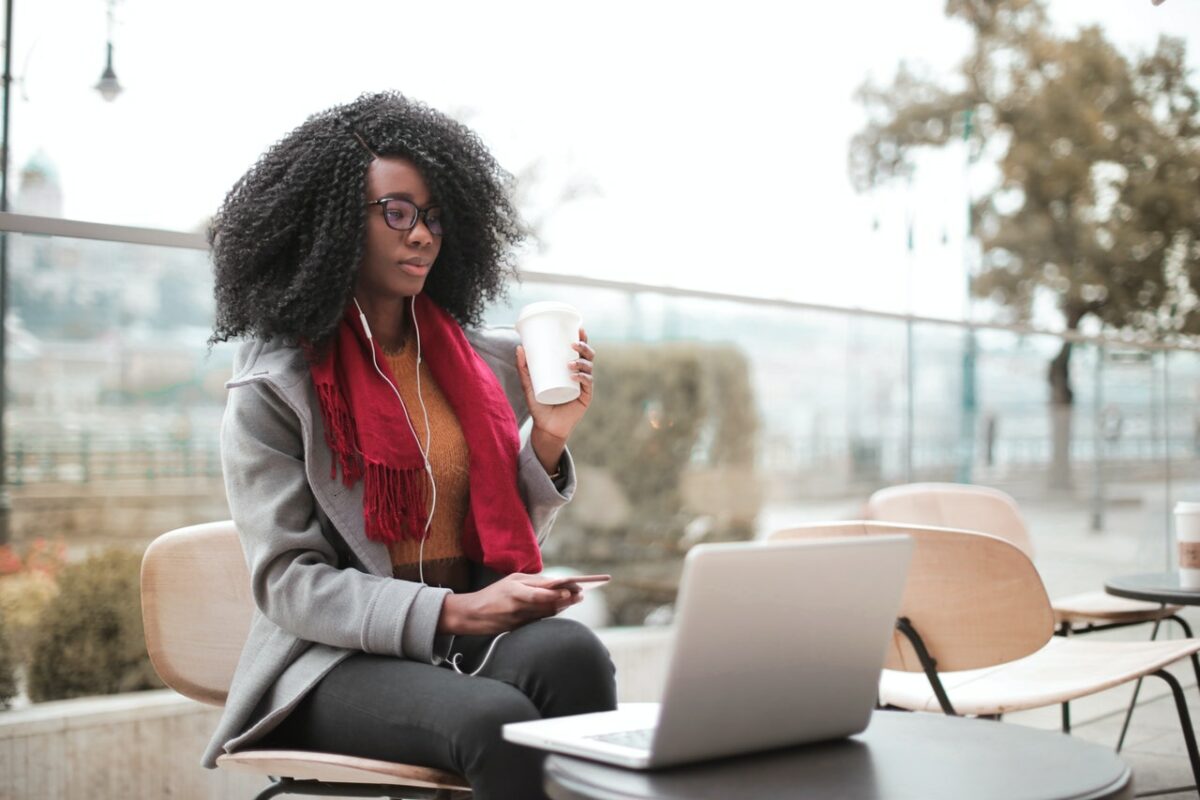 female sat at laptop