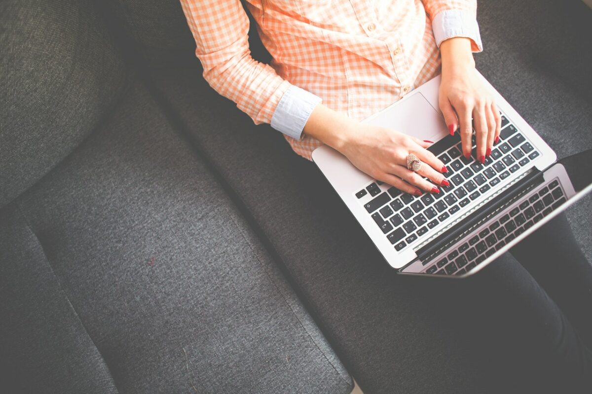 hands of someone on laptop