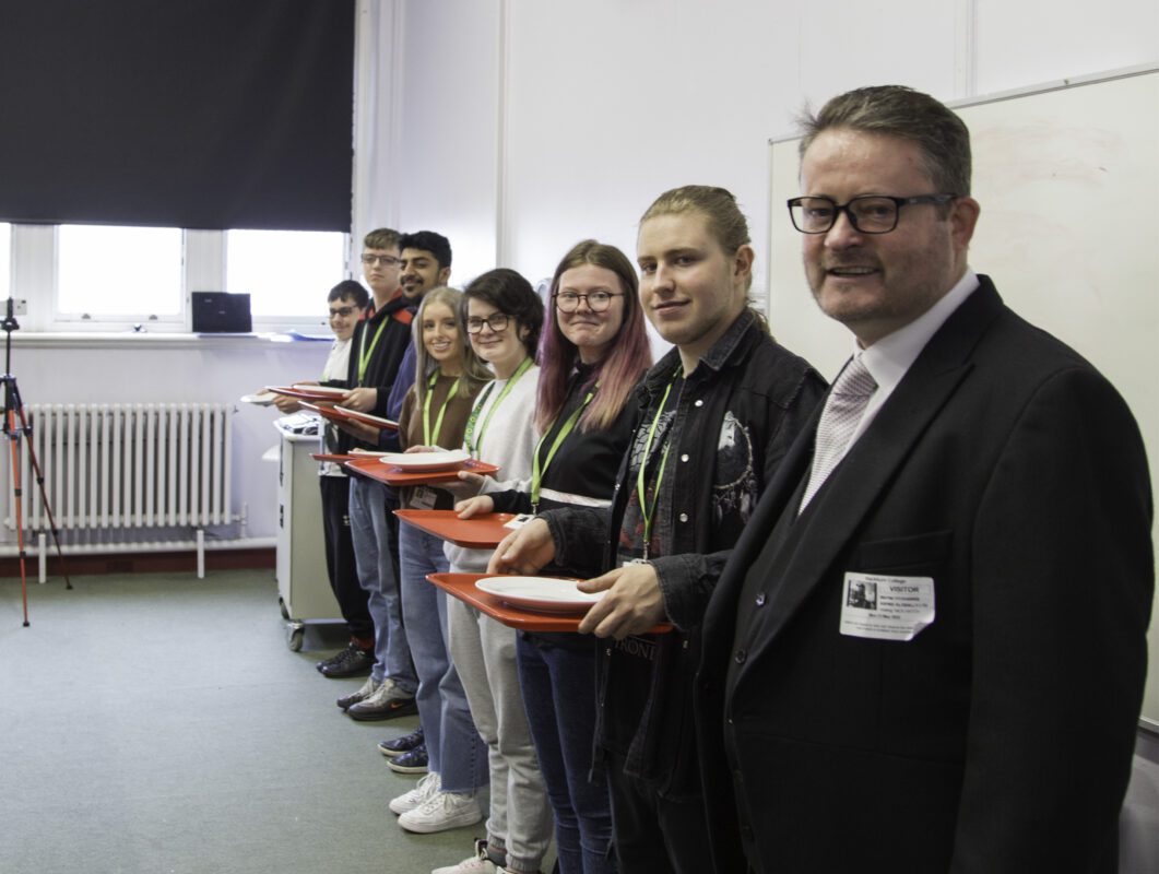 Blackburn College students pose with Aspire Global butler