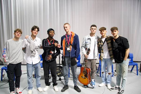 Barnsley College students with musical group, Here at Last.