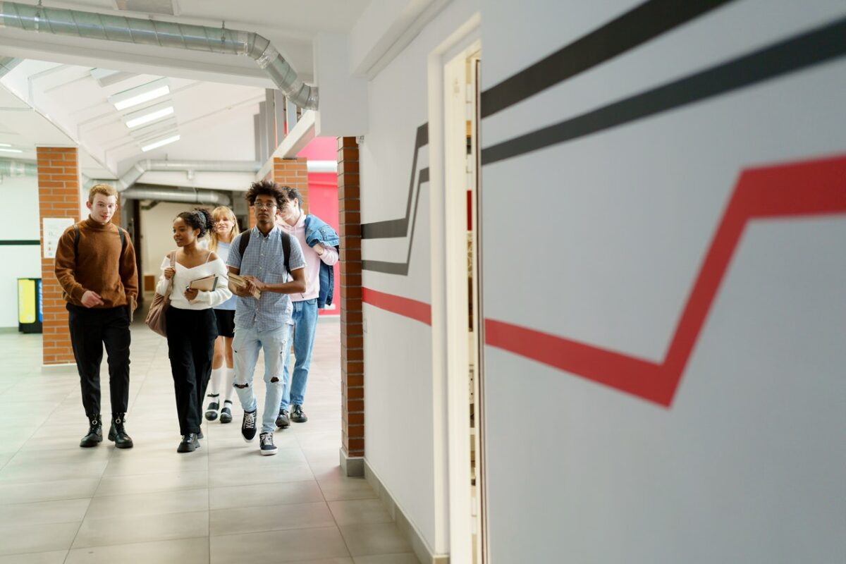 students walking through corridor