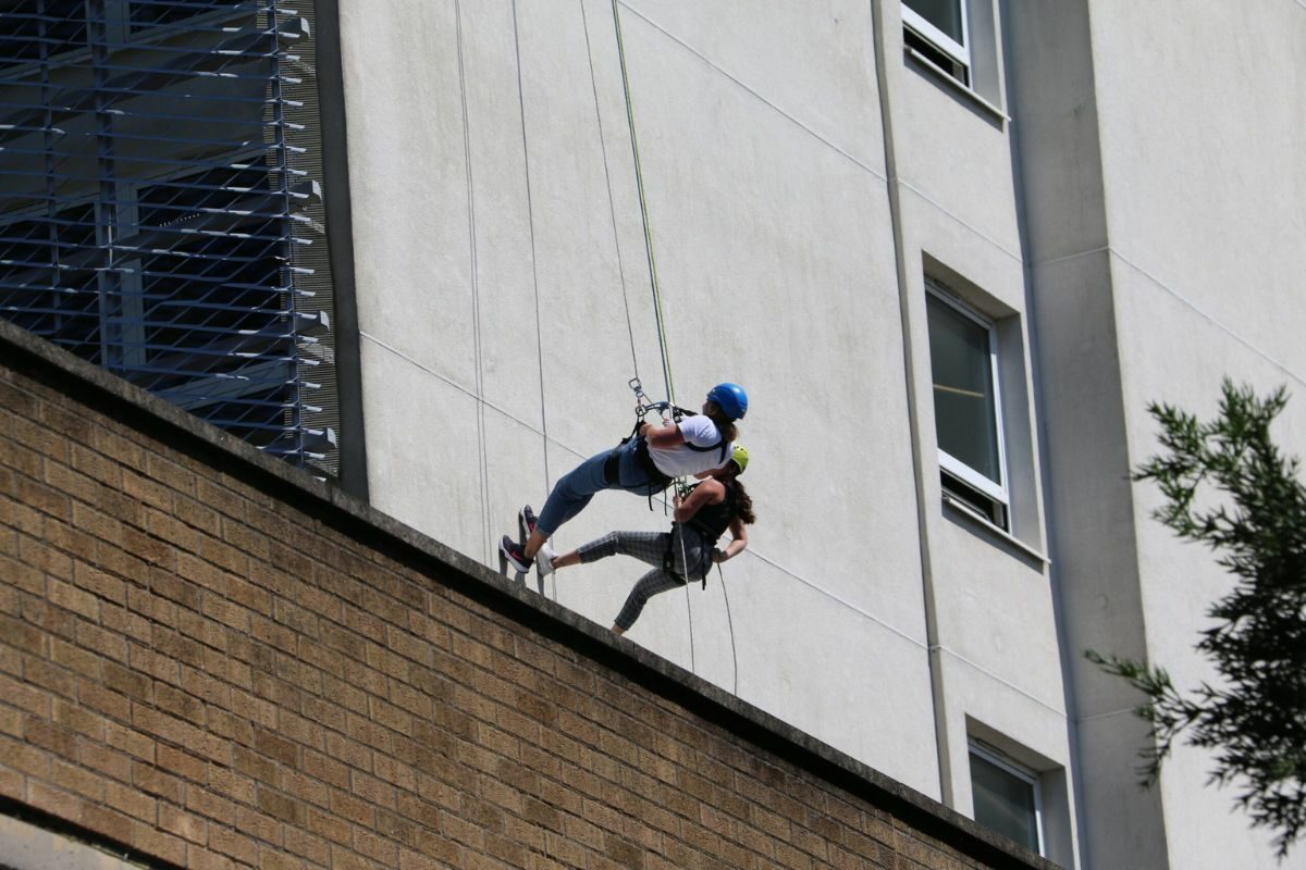 Daring descents from City College tower block for two special causes