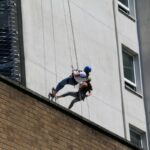 Daring descents from City College tower block for two special causes