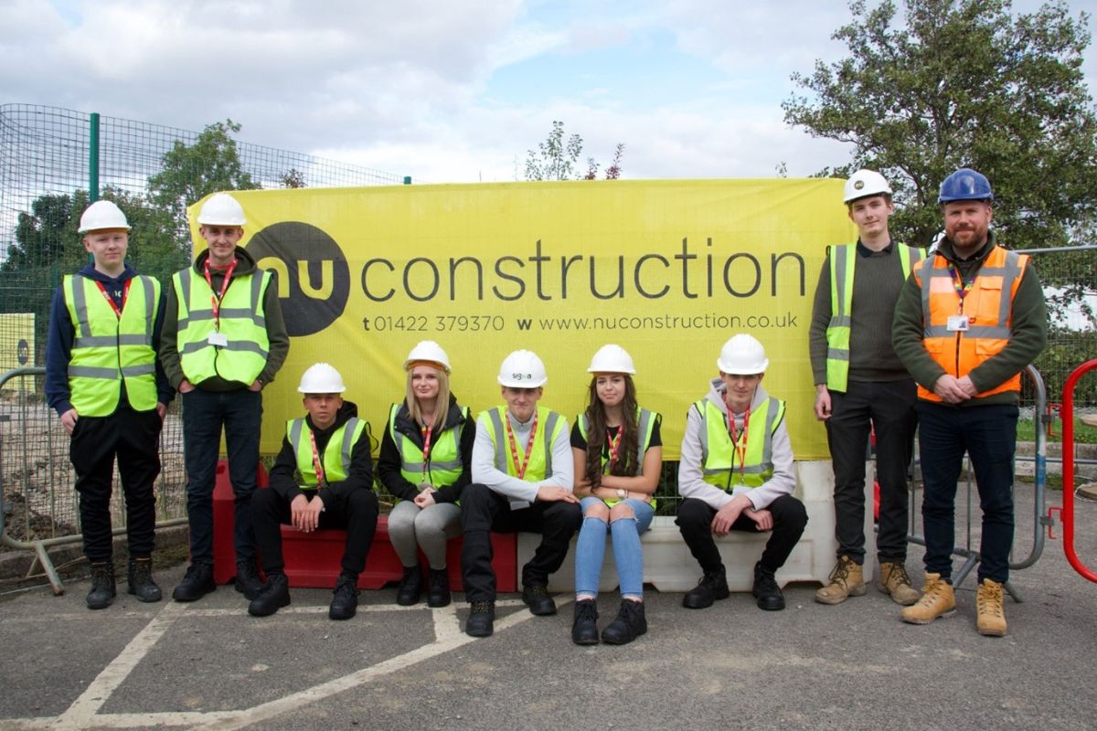 Barnsley College Construction T Level students and teaching staff at the site of the College's new £3.5m automotive centre.