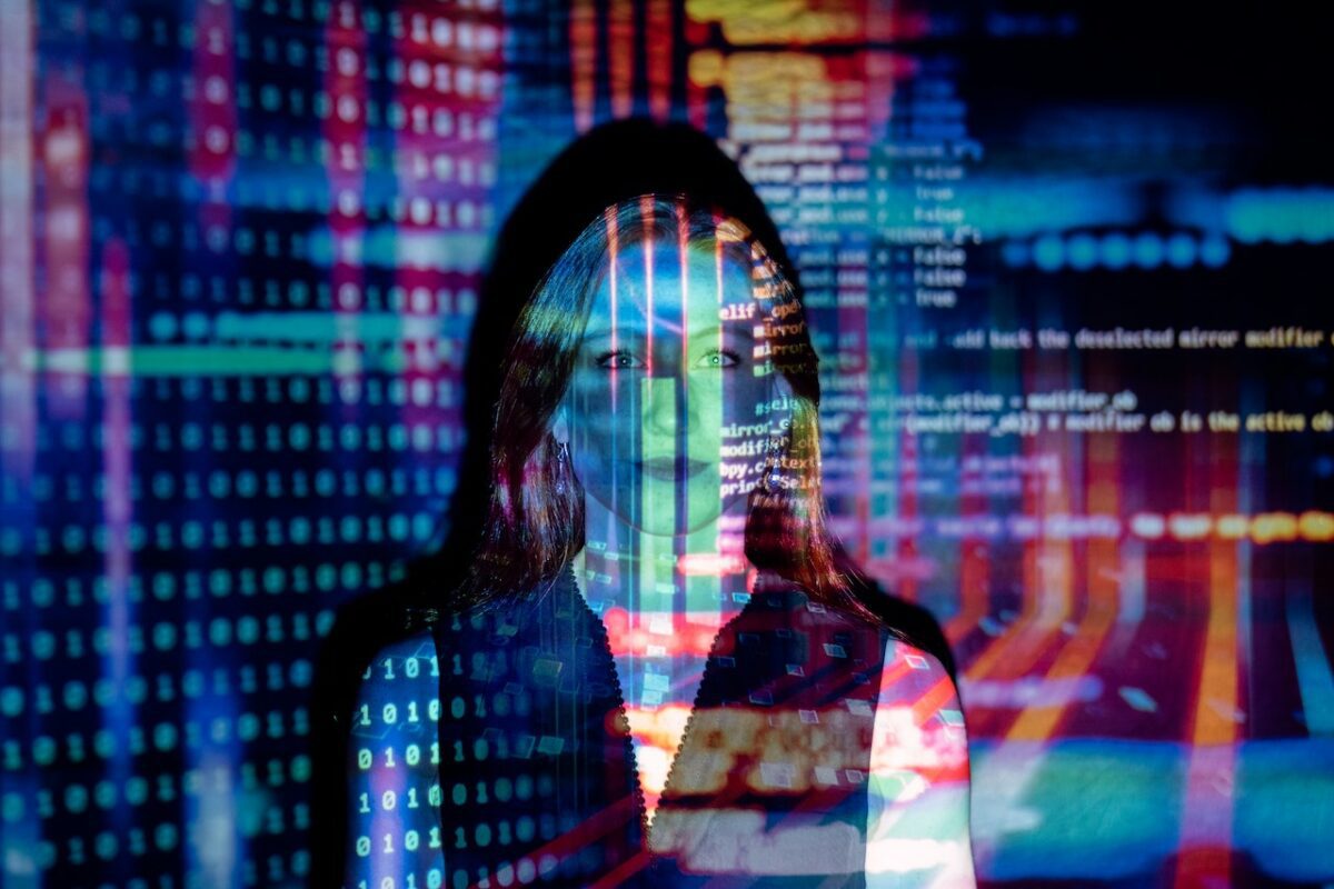 woman stood in front of projector