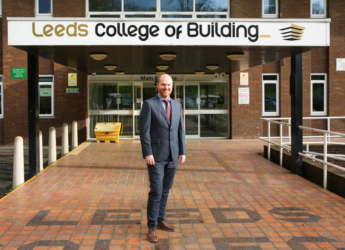 Chris Tunningley, Leeds College of Building Assistant Principal - Adult Learning & Higher Education, stands outside the College's North Street Campus entrance.
