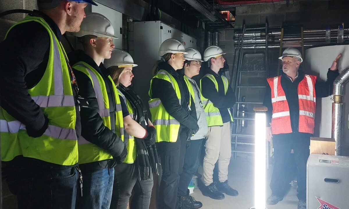 Electrical installation students from Leeds City College inspecting the switch room of Printworks Campus’ new £4.5m teaching block. Photograph by Premier Modular.