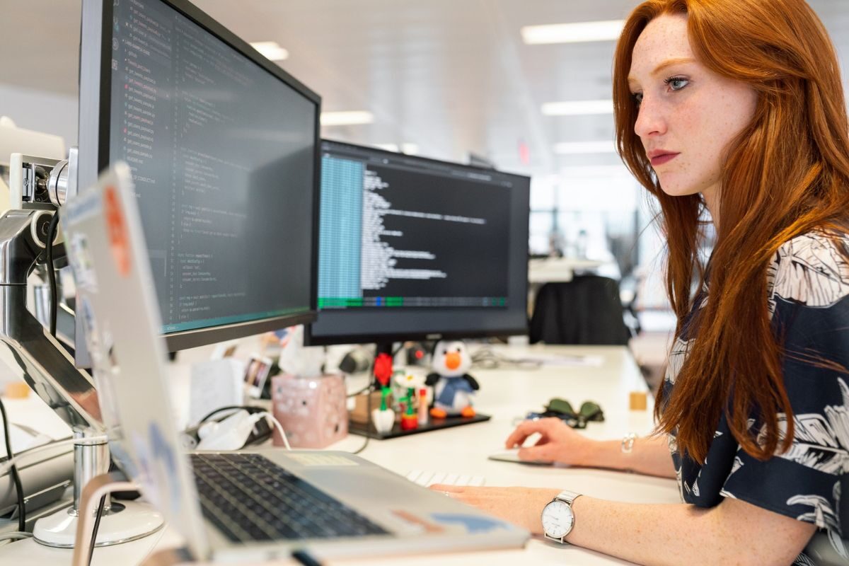 female looking at computers