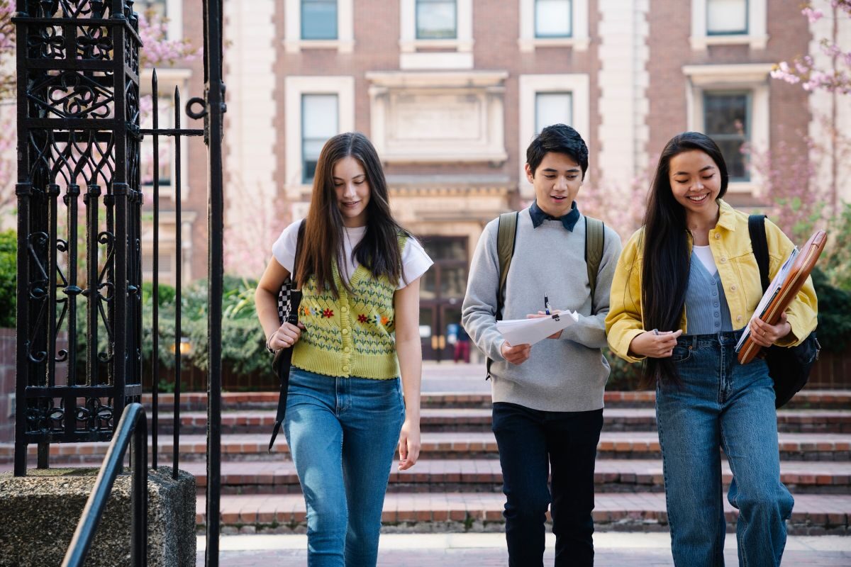 students walking through gate