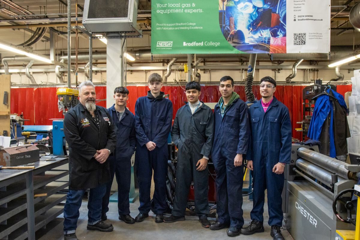 Lecturer in Fabrication and Welding Tony Carter with a group of Bradford College welding students.