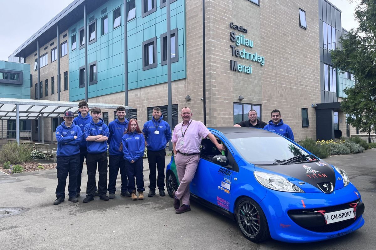 Motorsport Engineering students with the Peugeot 107 that will compete in the Student Motorsport Challenge