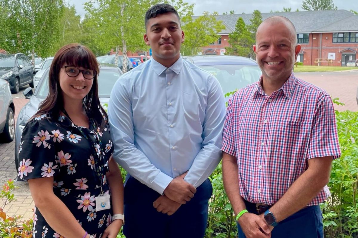 Rahim Arif with Emily Byrnes, programme leader for Level 3 IT and Degree Apprenticeships at Coleg Llandrillo, and Andrew Scott, programme leader for Degree Apprenticeships