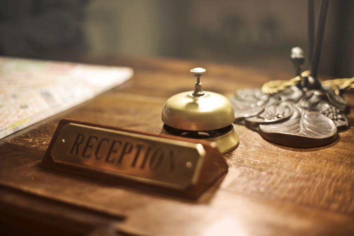 hotel reception sign and bell