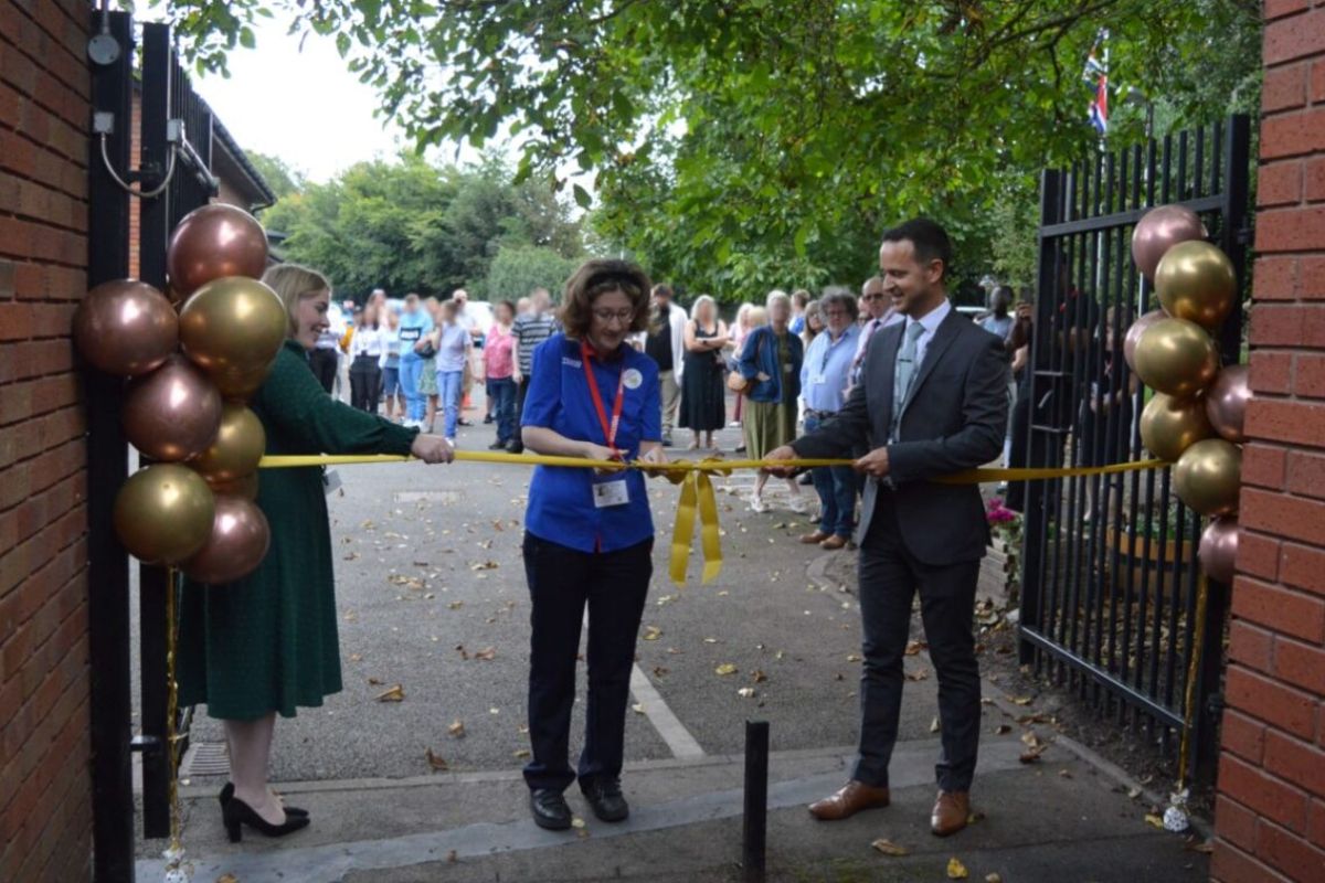 Former pupil Charlotte Asley cuts the ribbon on the new Sixth Form block at Queen's Croft High School in Lichfield. Pictured with her are (left) co-headteacher Letitia Carter and Sam Wood.