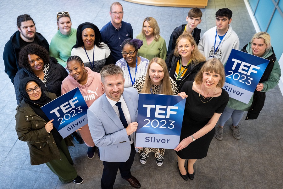 SILVER IS PRECIOUS | Flanked by UCO staff and learners, Susan Holden (Assistant Principal HE & Higher Skills at UCO) and Simon Jordan (Principal and Chief Executive at Oldham College) celebrating TEF Silver at the University Way site.