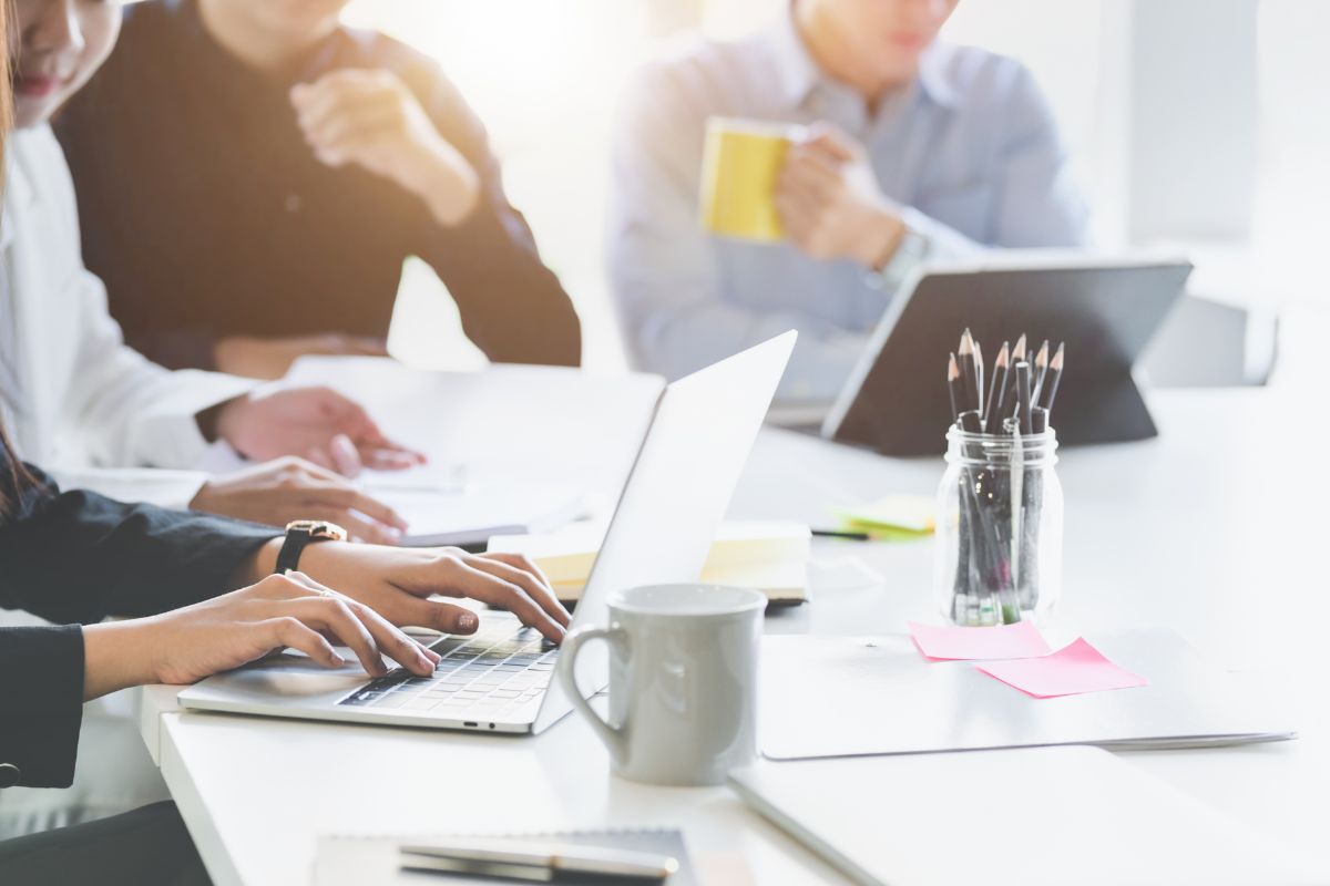 people working at a desk