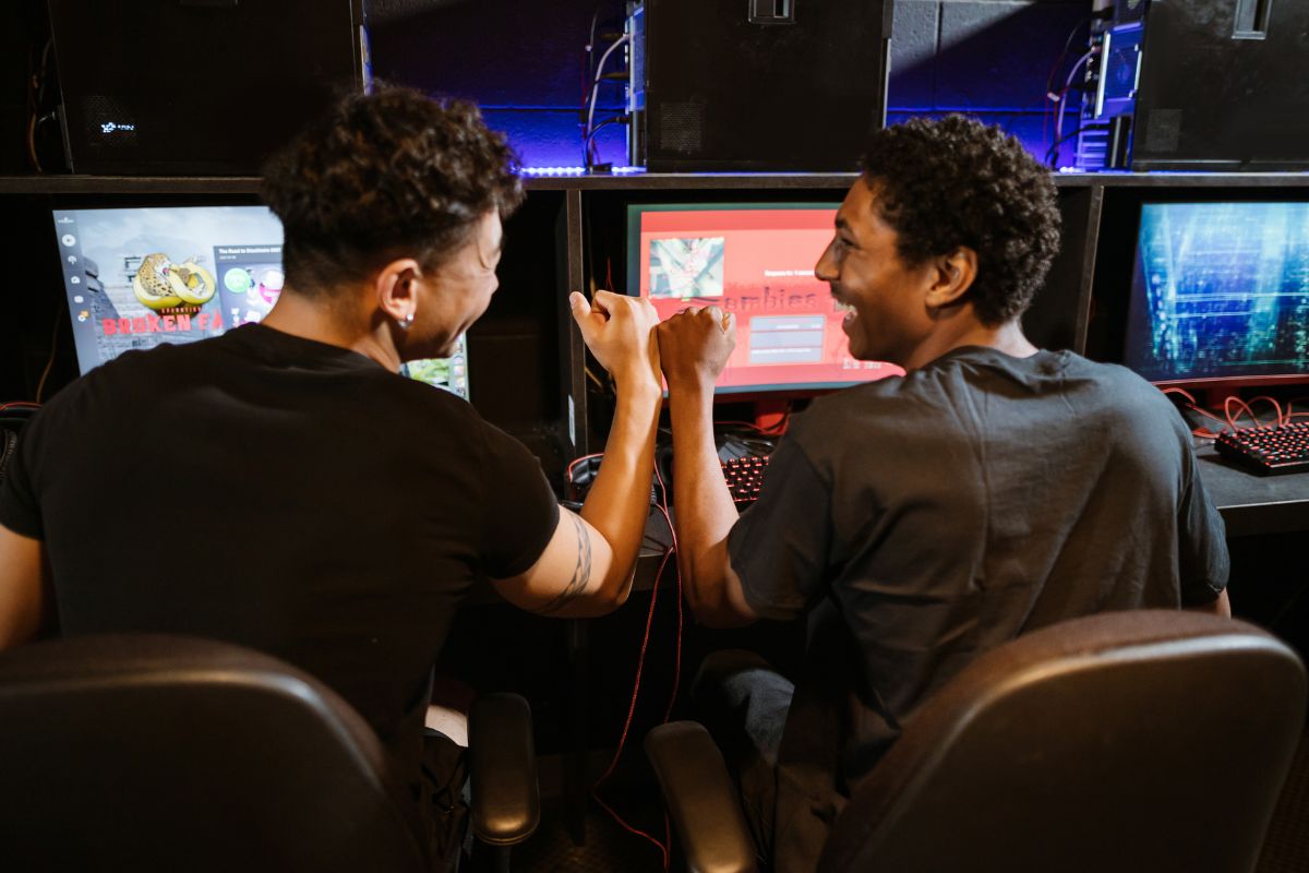 two guys celebrating in a gaming competition
