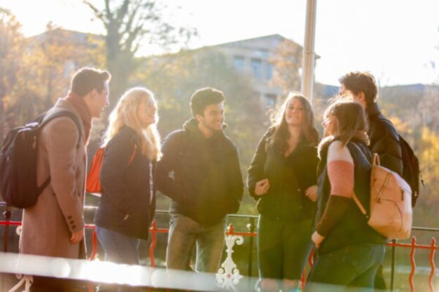 group of students chatting outside
