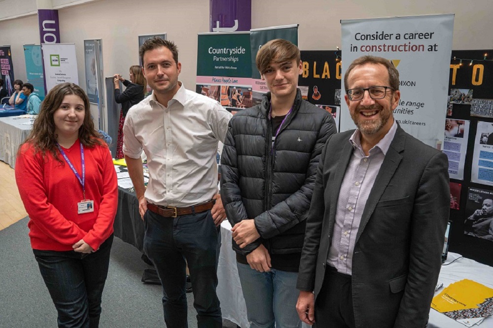 Left to right: Bianca Marcu A Level student at South Devon College, Anthony Mangnall MP, Mark Aldridge A Level student at South Devon College and Laurence Frewin, Principal at South Devon College.