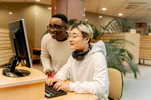 2 students learning on a computer