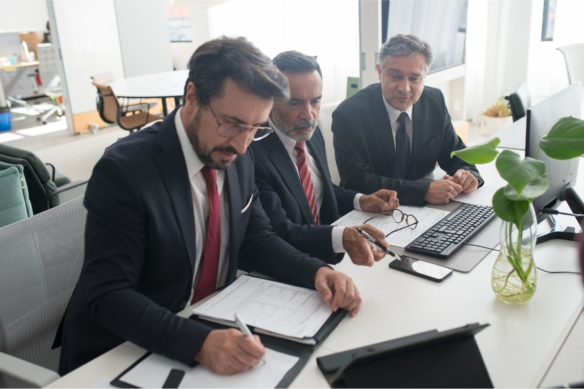 men in suits discussing