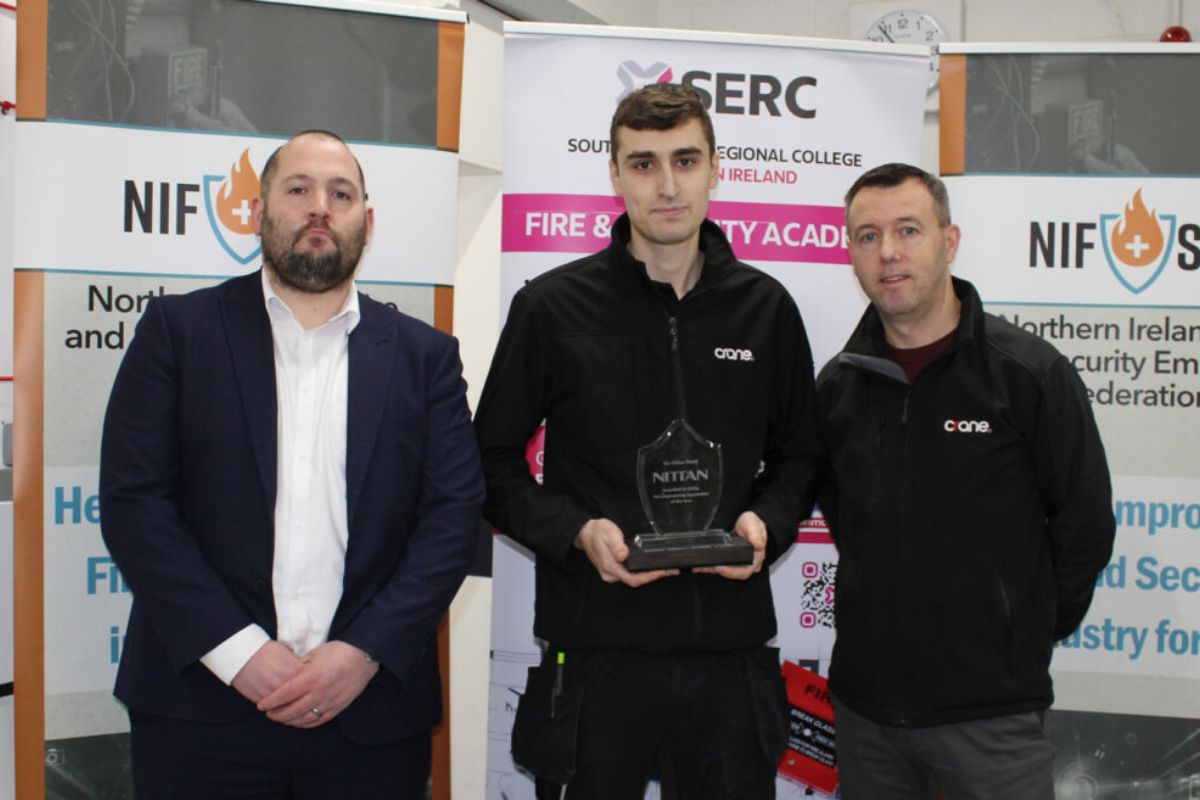 L -R Bobby Nixon, Sales Manager, Nittan Europe Ltd, who presented the Award, Christopher Orr with employer, Harry Dollin, Operations Manager, Crane Communications.