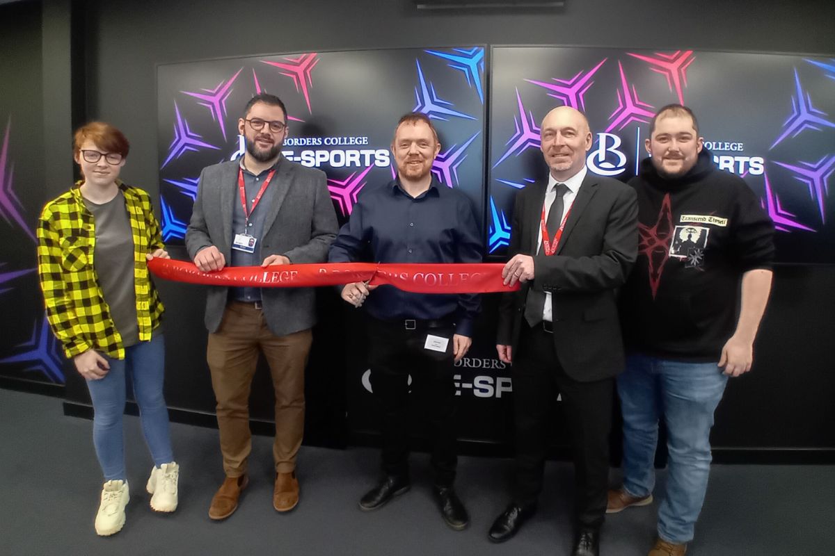 Group of people officially opening Esports studio