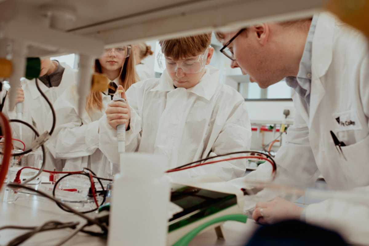 Students using scientific equipment