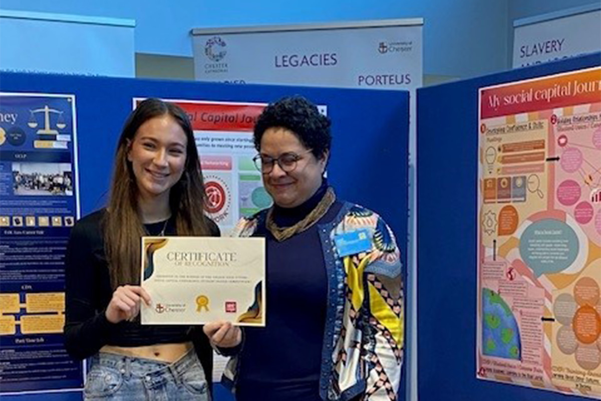 University of Chester students holding certificate