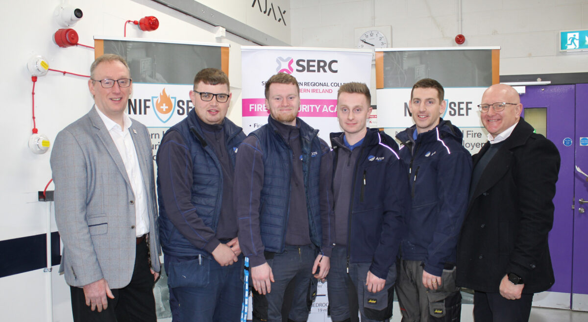 Ian Fiddis, Chair of the Northern Ireland Fire & Security Federation who presented EAL Awards to SERC Level 3 Fire & Security Apprentices, Tiernan Maxwell (Belfast), Ronan McConnell (Belfast), Harrison Reddick (Bangor), Alexander Wallace (Saintfield) all employed by Atlas World, with Graeme White,  Atlas World.