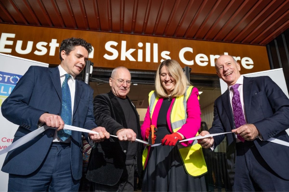 Huw Merriman, Sir Peter Hendy (Chair of the Euston Partnership Board), Georgia Gould and Jules Pipe ‘saw’ the ribbon