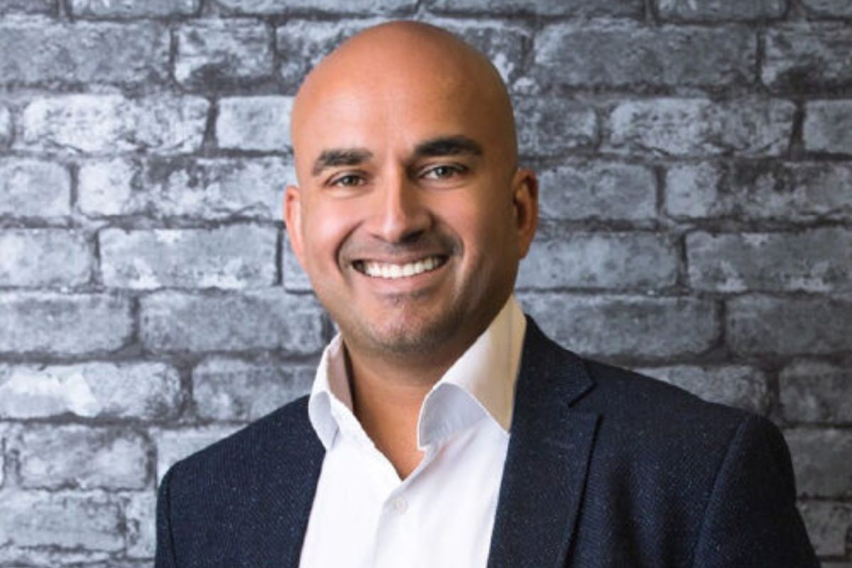 head shot of a man in a suit