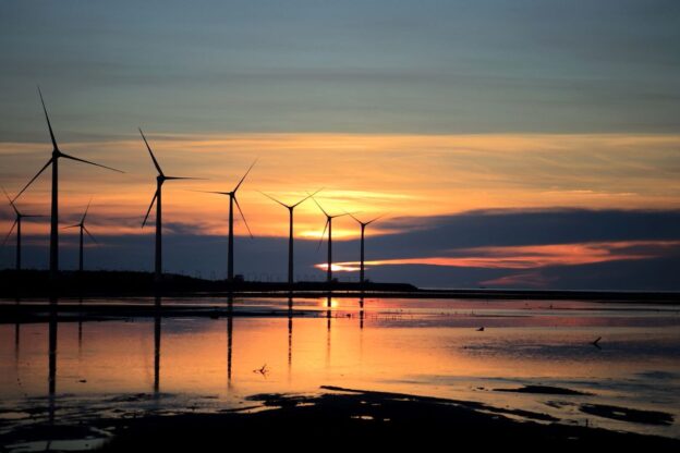 Wind farm with the sun setting