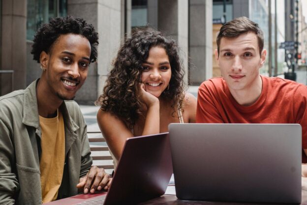 students with laptops - pexels stock