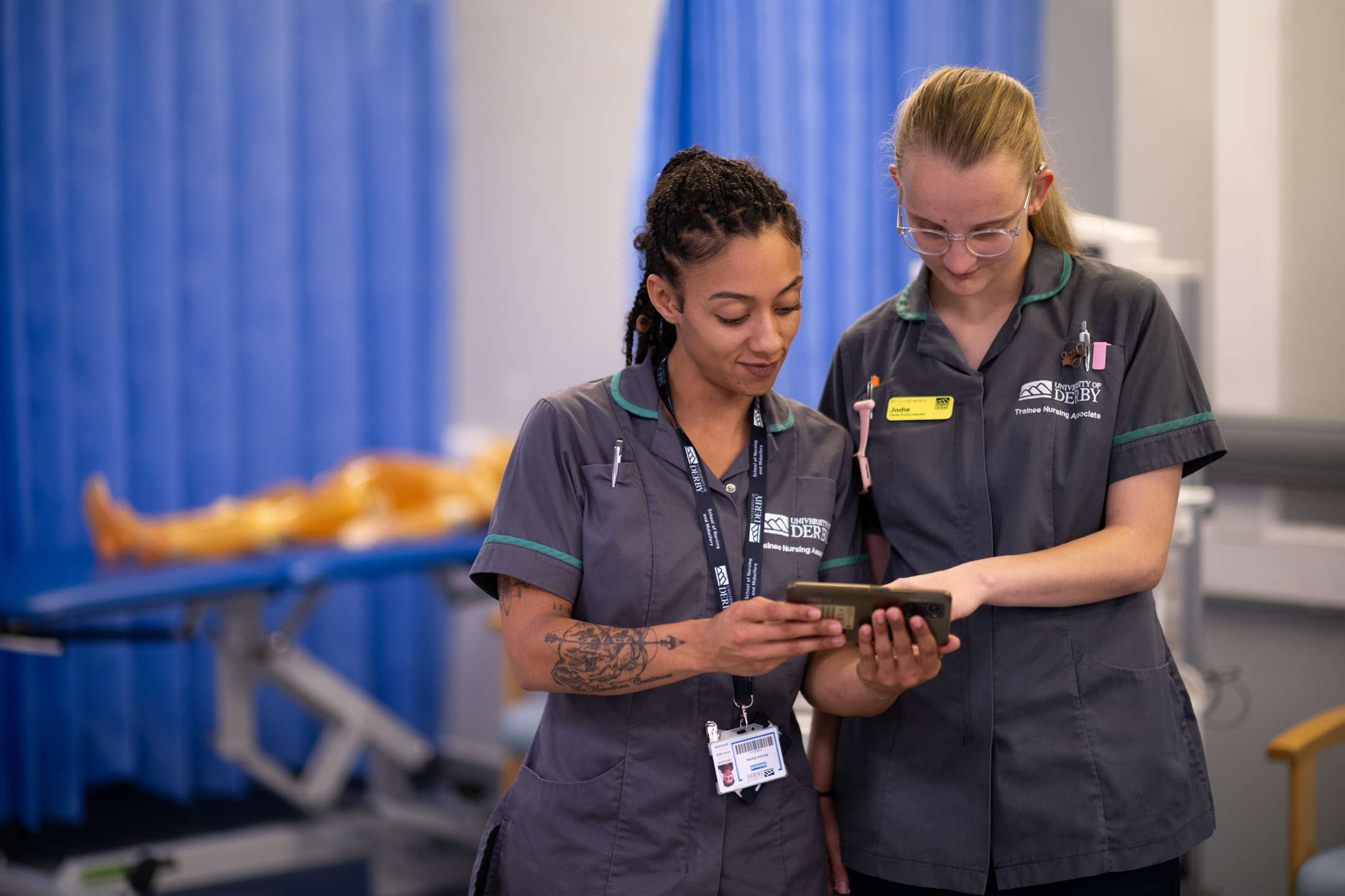 Care students using mobile learning app to train.