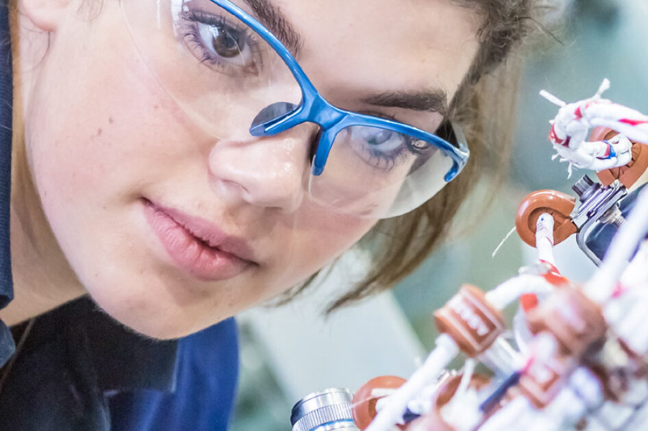 a female apprentice working at Rolls-Royce