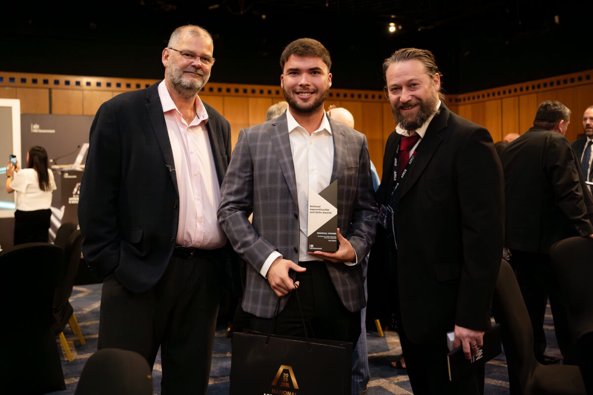 A photo of Chris Wood, John Elliott and Ethan Roberts.