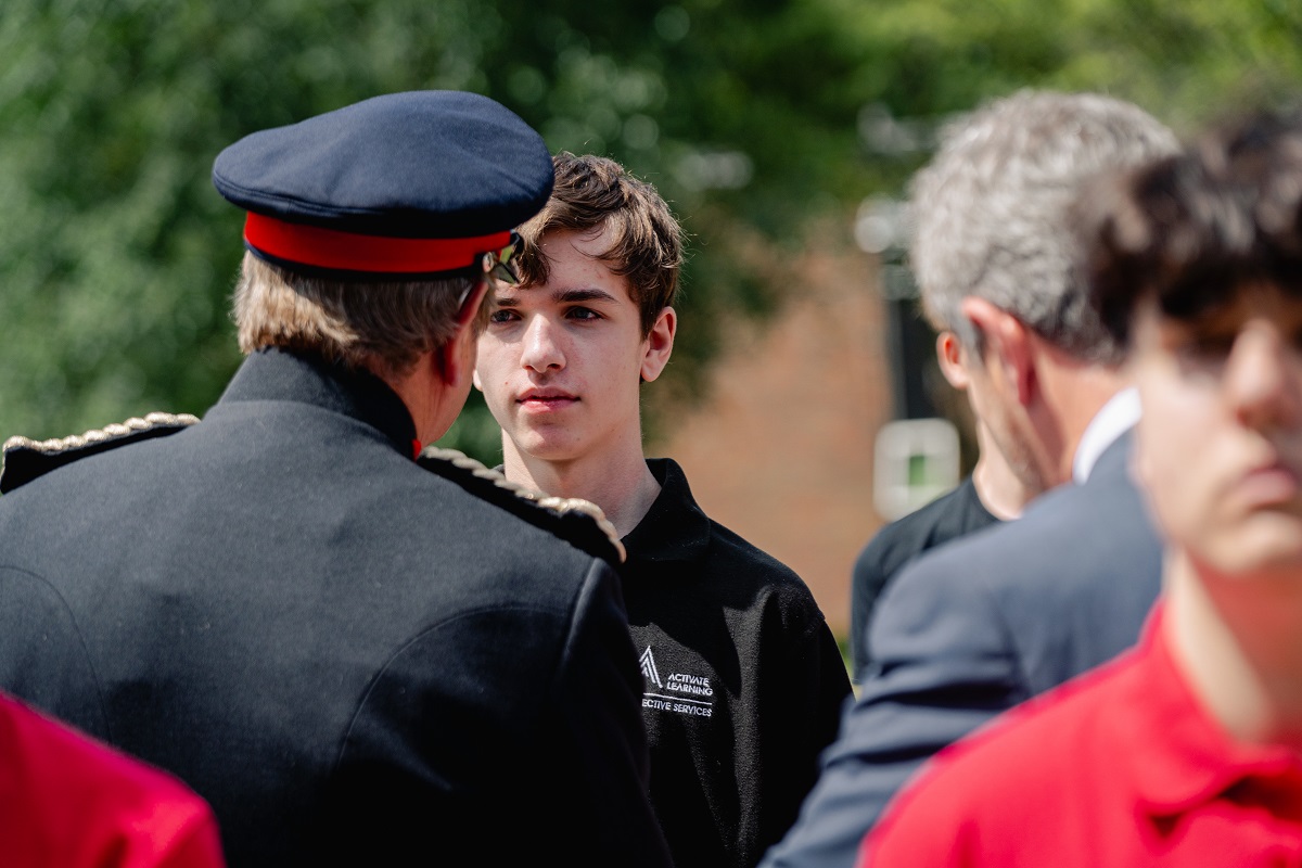 Passing-Out-Parade-Merrist-2024---80 Lord-Lieutenant for Surrey, Michael More-Molyneux, Gary Headland, CEO, Activate Learning and a Public Services student.