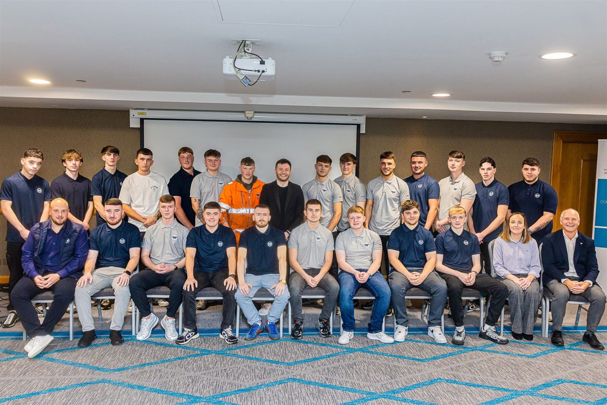 Group of rail track apprentices celebrate at recognition event,
