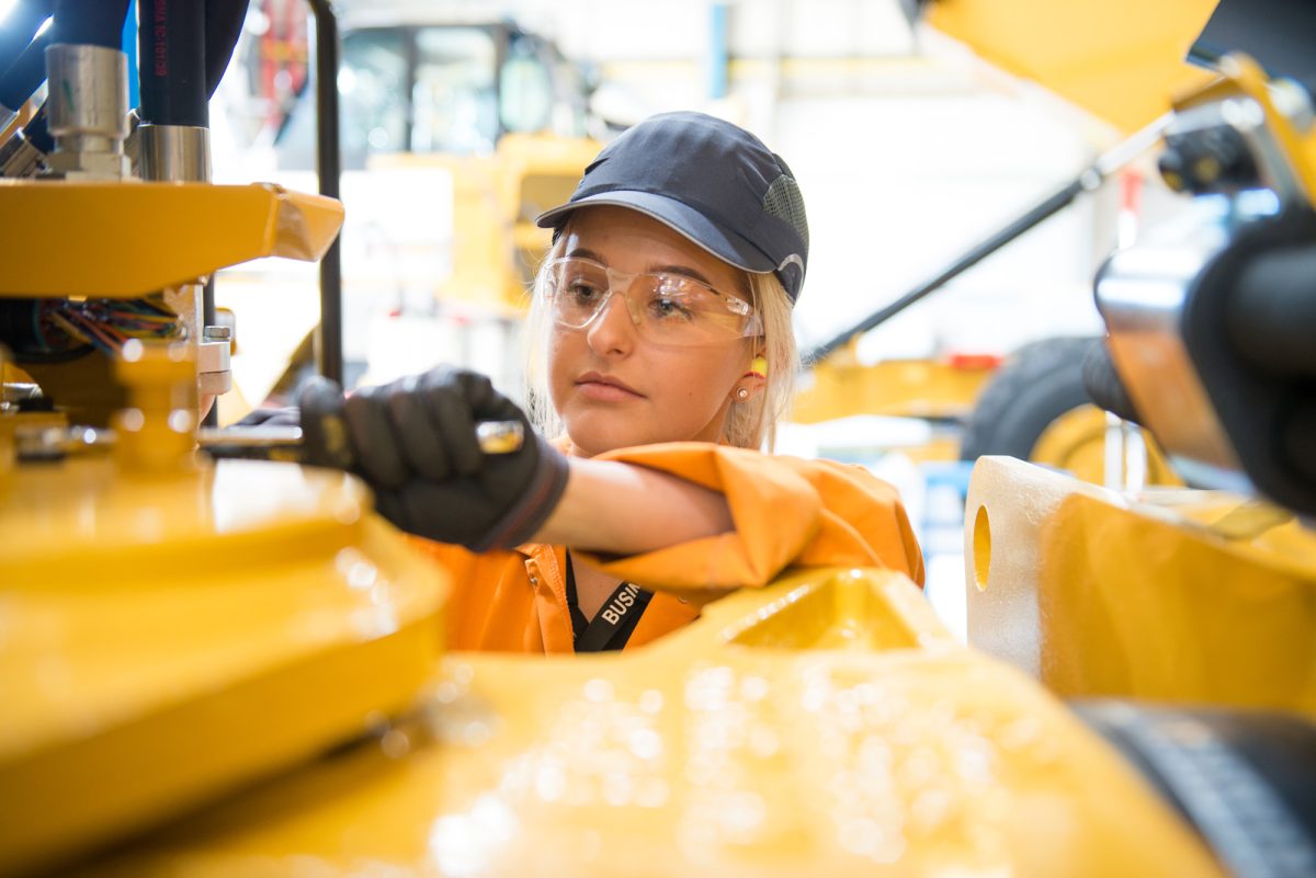 A female apprentice at work